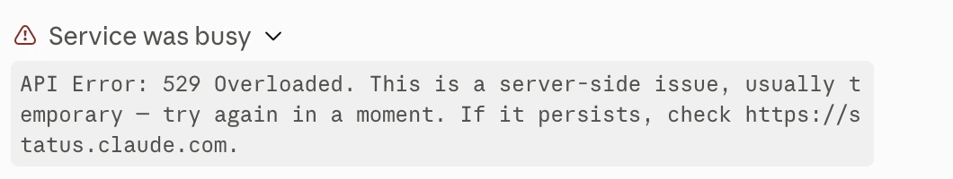 The expanded 'Service was busy' detail in Claude Code, showing the text: API Error: 529 Overloaded. This is a server-side issue, usually temporary — try again in a moment. If it persists, check https://status.claude.com.