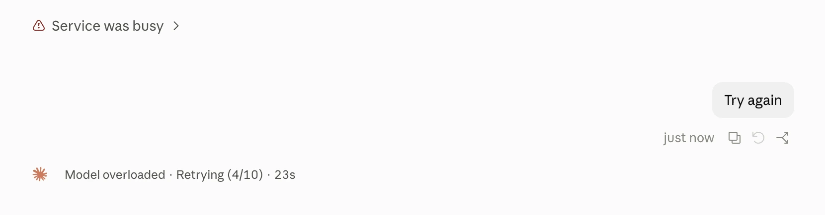 A Claude Code status line reading 'Model overloaded · Retrying (4/10) · 23s', with a Try again button above it.